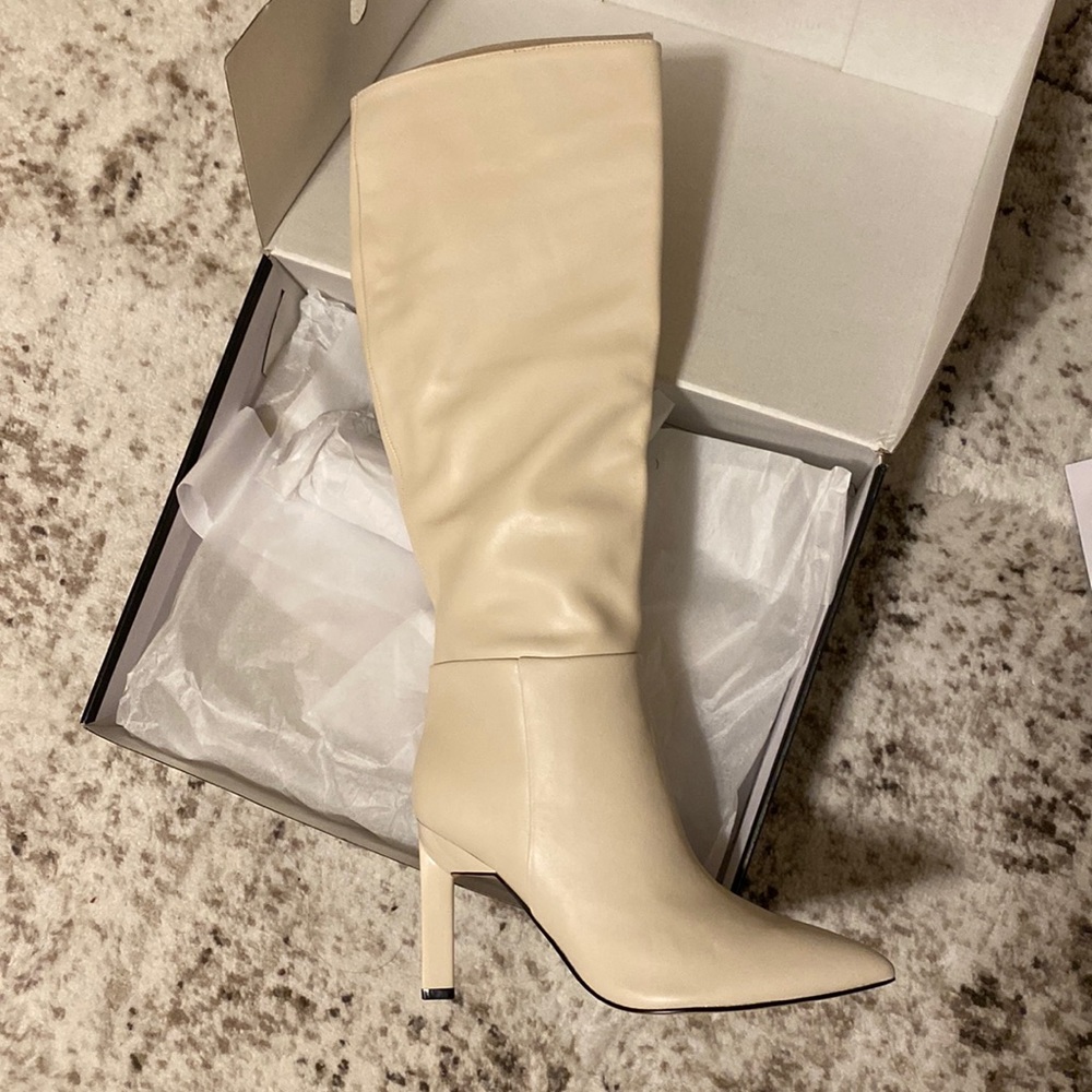 Beautiful knee high boots, never worn.